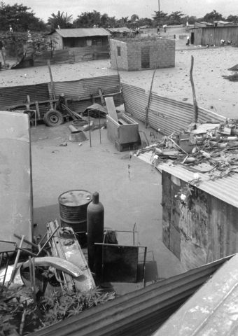 Broken service lines compounded by impervious soils in many areas. Photos taken in Sambizanga by Bob Van der Winden; as part of his research for his book titled "The Family in The Musseque" .
