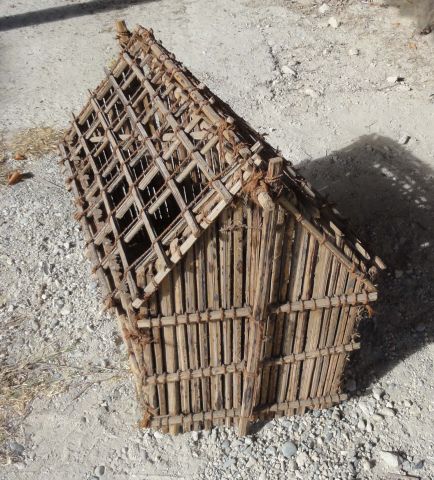 Model made in Oman by a local builder showing palm frond stems (barast) andi date palm frond stem construction.
